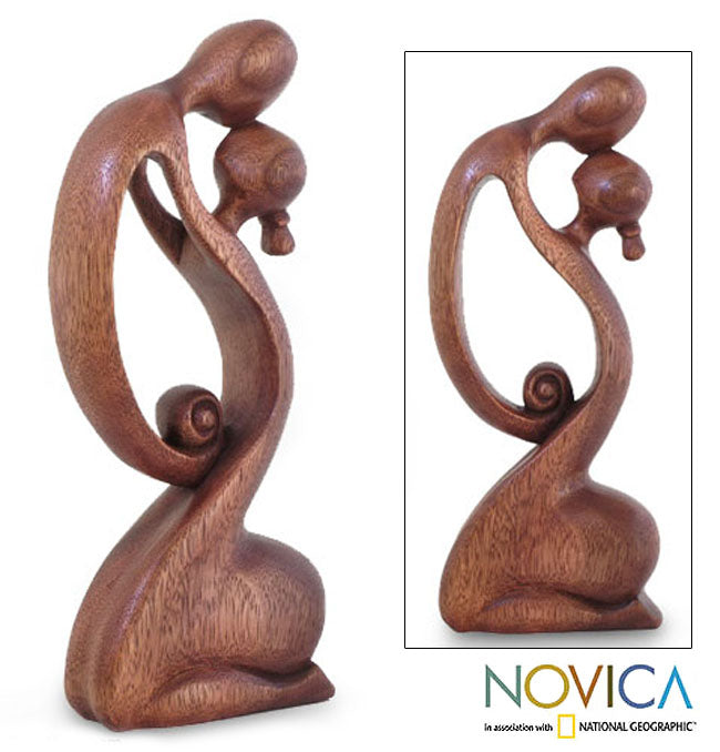 A Mother's Kiss Suar Wood Sculpture