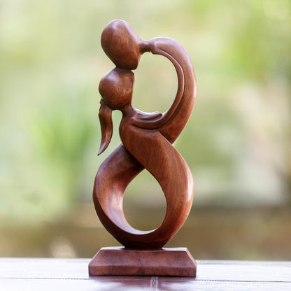 Kiss Me Romantic Suar Wood Sculpture