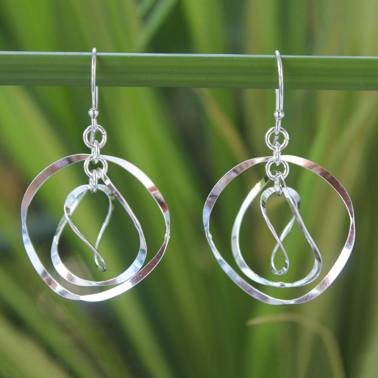 Twirling Silver Circular Dangle Earrings