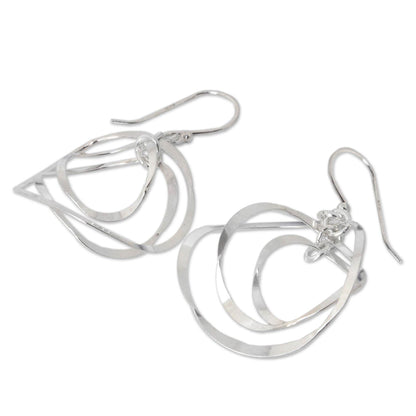 Twirling Silver Circular Dangle Earrings