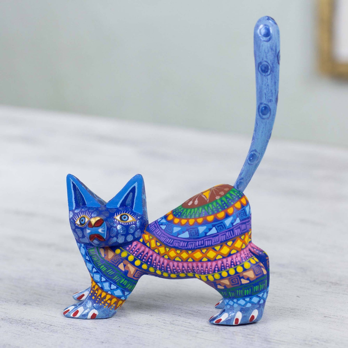 Playful Blue Kitten Wood Sculpture