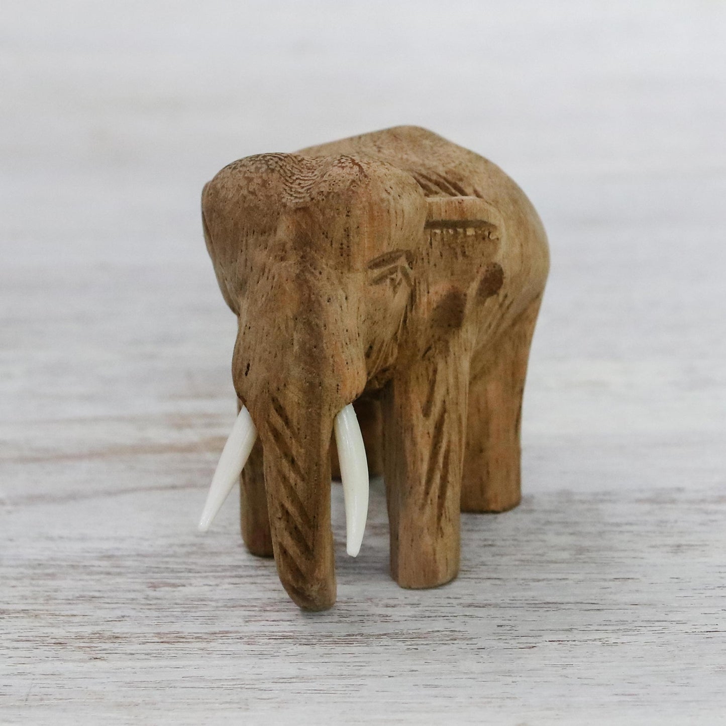 Peaceful Elephant Brown Wood Sculpture