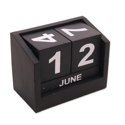 Counting the Days in Black Wood Perpetual Calendar in Black from Bali