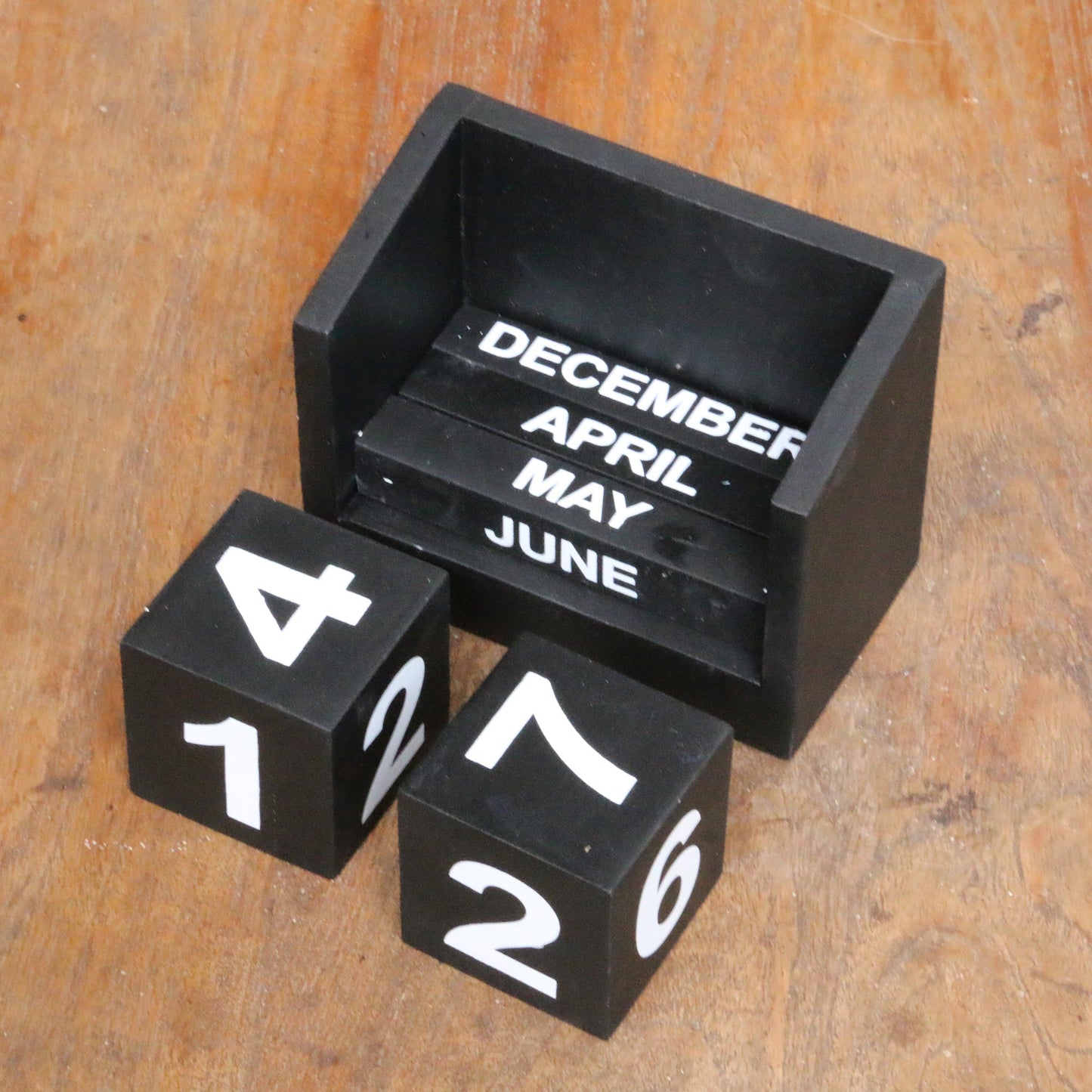 Counting the Days in Black Wood Perpetual Calendar in Black from Bali